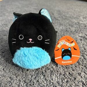 NWT original Squishmallows black and blue cat whose name is Eponine